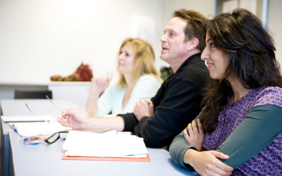 Group of adults in classroom training